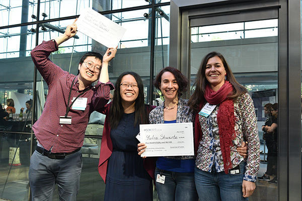 Ya-Chieh Hsu with award-winning members of her lab at the HSCI 2019 annual retreat