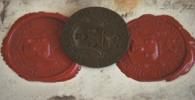 Iron seal of Isaac Royall with two red wax impressions on either side