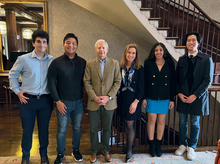 Juster Fellows pose with Kenneth Juster at the Harvard Faculty Club