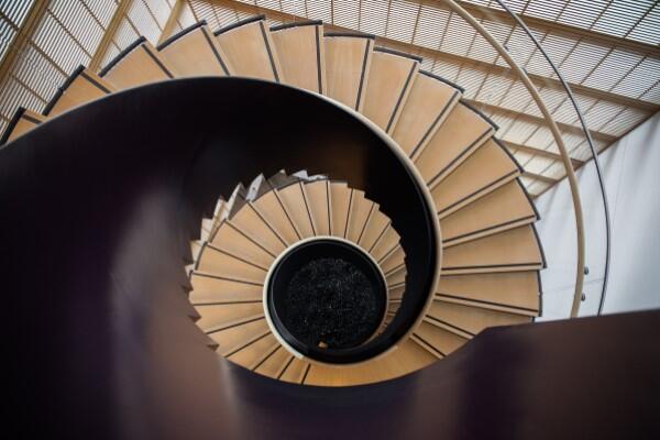 Downward view of CGIS Knafel&#039;s spiral staircase