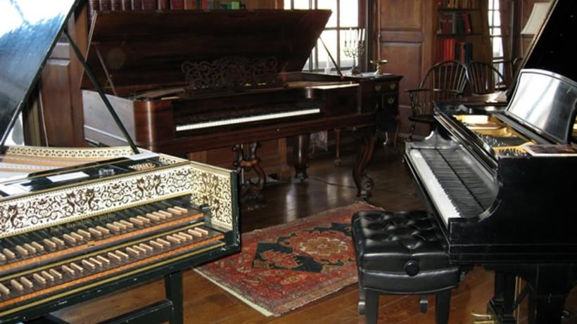 Harpsichord, square grand, and Steinway model B grand piano in Dunster House library